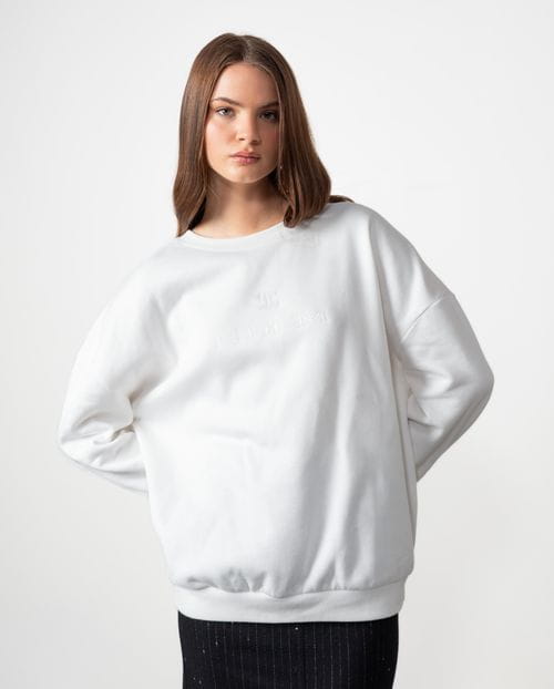 Sudadera 'oversize' con bordado en delantero y manga izquierda