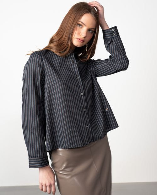 A-line shirt with multi-stripes over a  black background