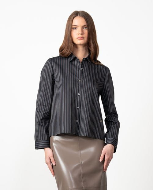 A-line shirt with multi-stripes over a  black background