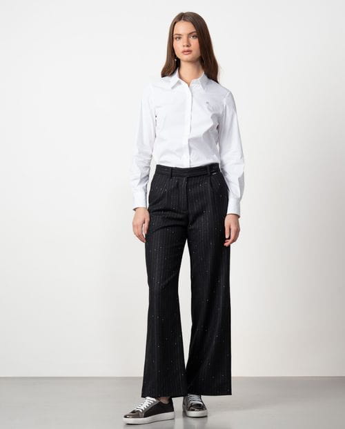 Men's tailored trousers with pleats made in wool fabric with pinstripe pattern