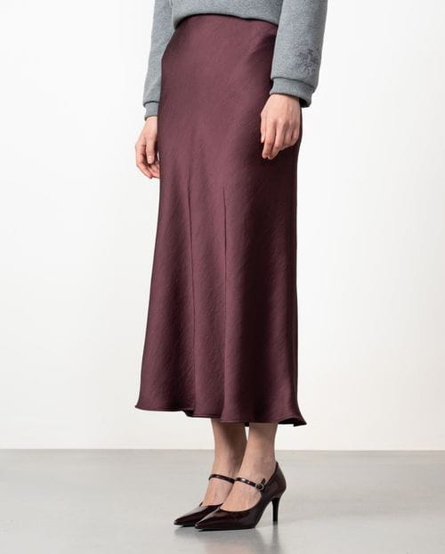 Midi skirt in satined fabric cut on the bias with personalized elastic band