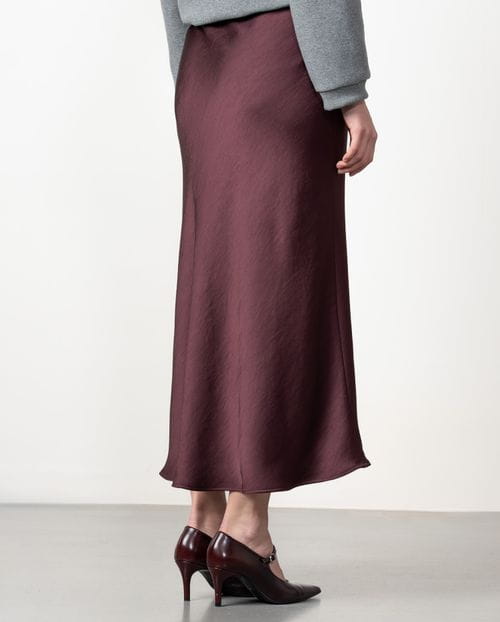 Midi skirt in satined fabric cut on the bias with personalized elastic band