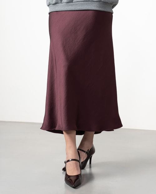 Midi skirt in satined fabric cut on the bias with personalized elastic band