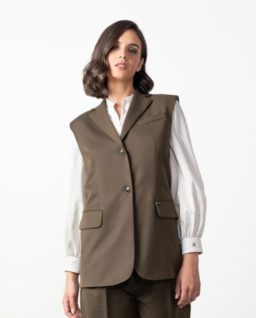 Long vest with shoulder pads and lapels made from polyester-viscose cool wool-style fabric