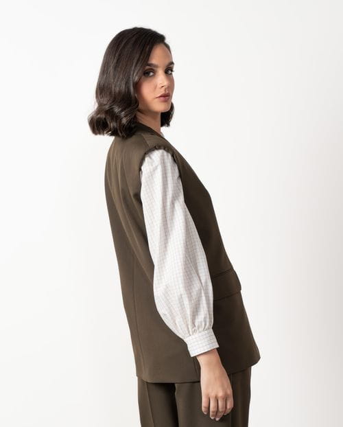 Long vest with shoulder pads and lapels made from polyester-viscose cool wool-style fabric