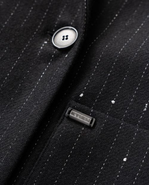 Chaqueta americana larga cruzada en sarga de lana con raya diplomática