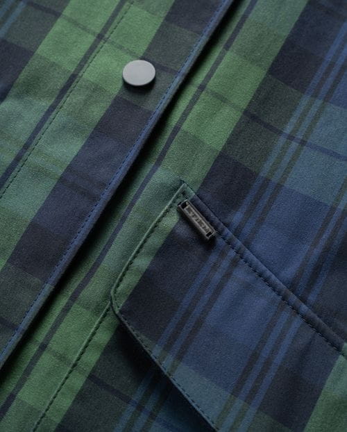 <p>Parka acolchada en algodón encerado de cuadros</p>