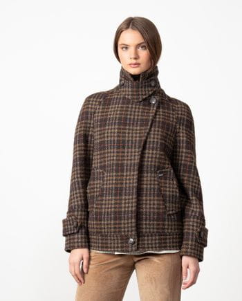 Double-breasted short coat with hidden fastening and funnel collar made from checked wool fabric