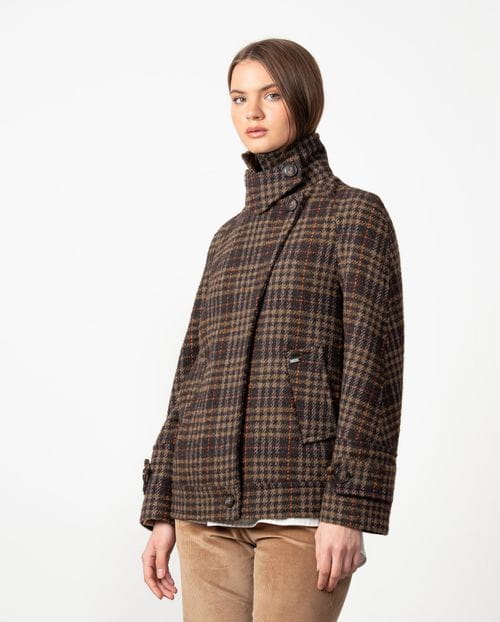 Double-breasted short coat with hidden fastening and funnel collar made from checked wool fabric