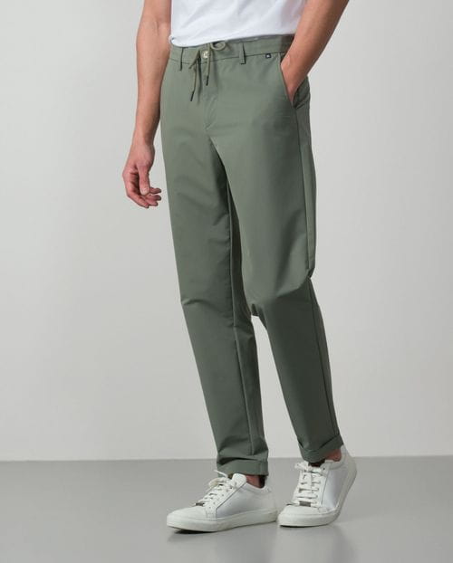 Trousers with cord and elastic waistbrand made of flexible technical fabric
