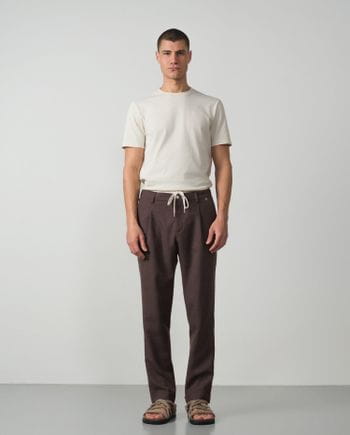 Pantalón de una pinza con cordón y goma en la cintura en tejido liso de lana-lino