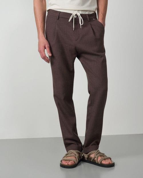<p>Plain wool-linen trouser with one pleat, cord and elastic waistband</p>