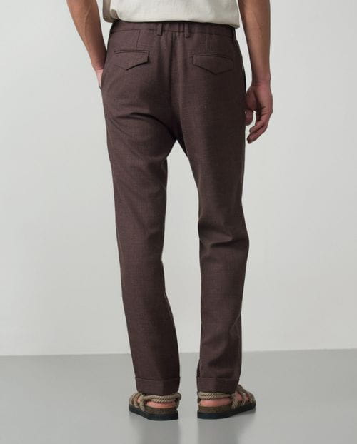 <p>Plain wool-linen trouser with one pleat, cord and elastic waistband</p>