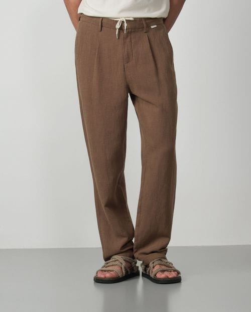<p>Linen-tencel trouser with one pleat, cord and elastic waistband</p>