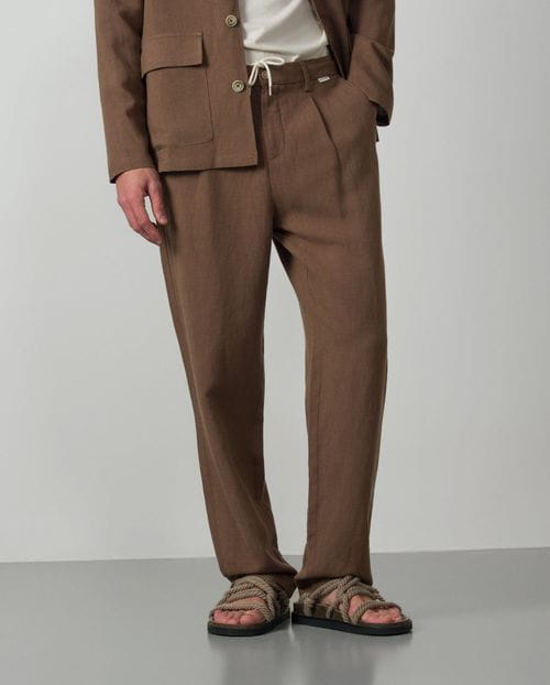 <p>Linen-tencel trouser with one pleat, cord and elastic waistband</p>