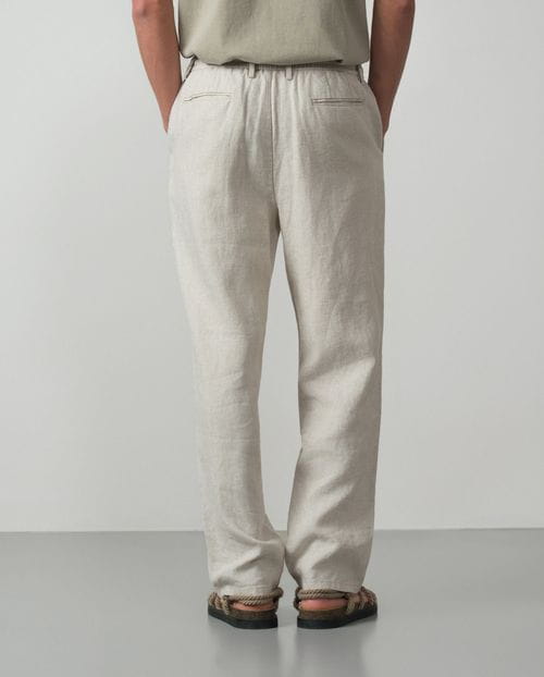Pantalón de una pinza con cordón y goma en la cintura hecho en lino 100%