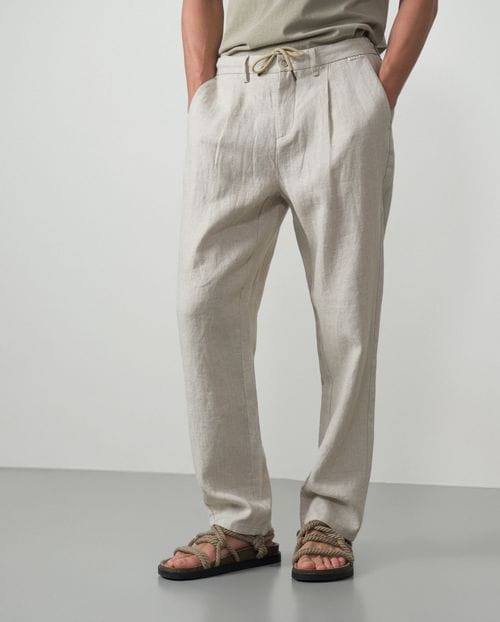Pantalón de una pinza con cordón y goma en la cintura hecho en lino 100%