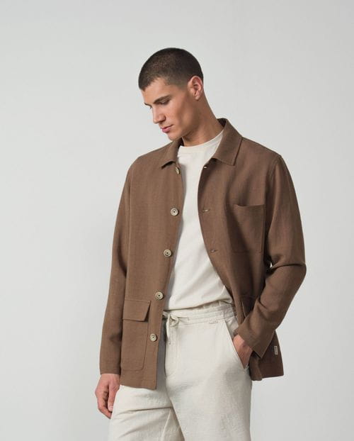 <p>Overshirt with patch pockets in plain linen-tencel fabric</p>