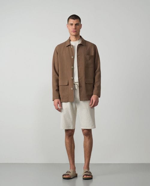 <p>Overshirt with patch pockets in plain linen-tencel fabric</p>