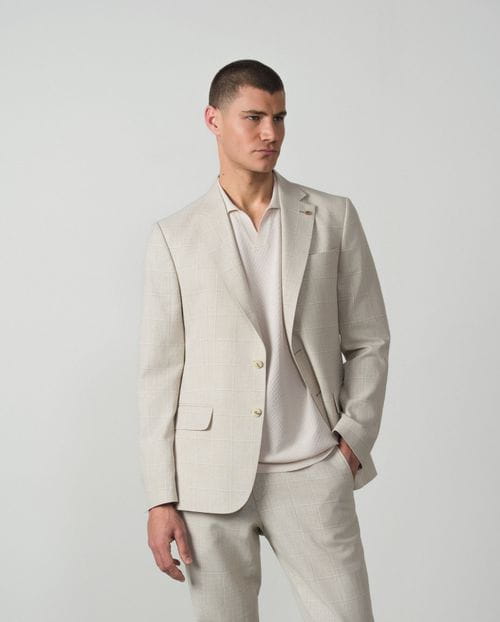 <p>Americana desestructurada <em>regular fit</em> en cuadro ventana de lino algodón</p>