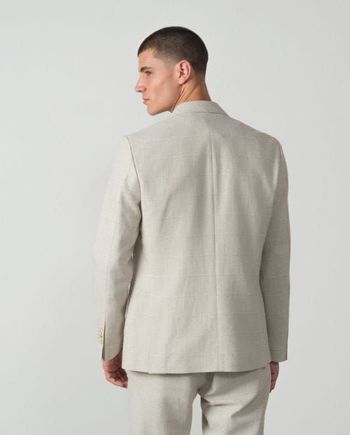 <p>Americana desestructurada <em>regular fit</em> en cuadro ventana de lino algodón</p>