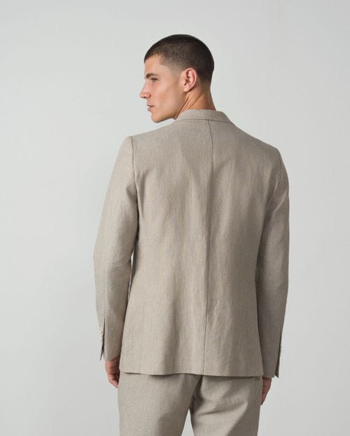 Unstructured and unlined slim fit blazer made from linen-cotton stripes