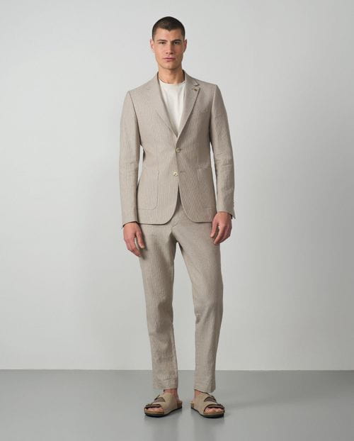 Unstructured and unlined slim fit blazer made from linen-cotton stripes