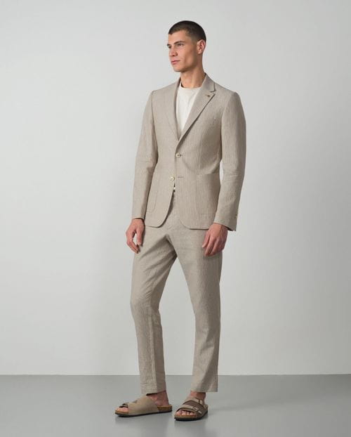 Unstructured and unlined slim fit blazer made from linen-cotton stripes