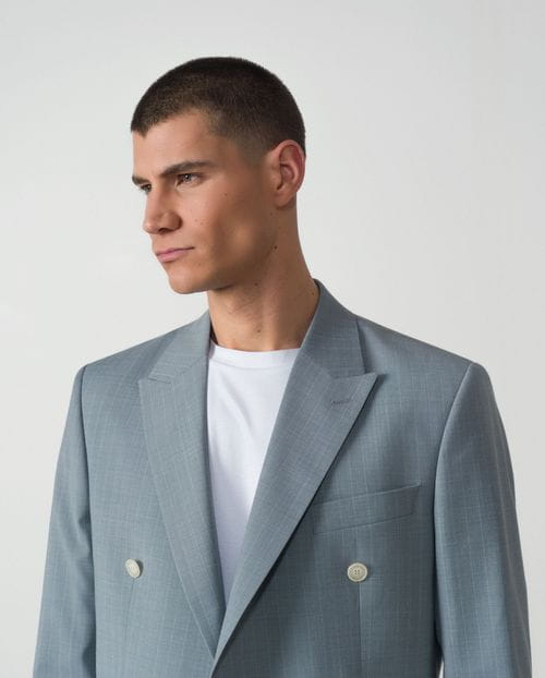 <p>Traje cruzado <em>slim fit</em> en raya diplomática de lana mezcla elástica</p>